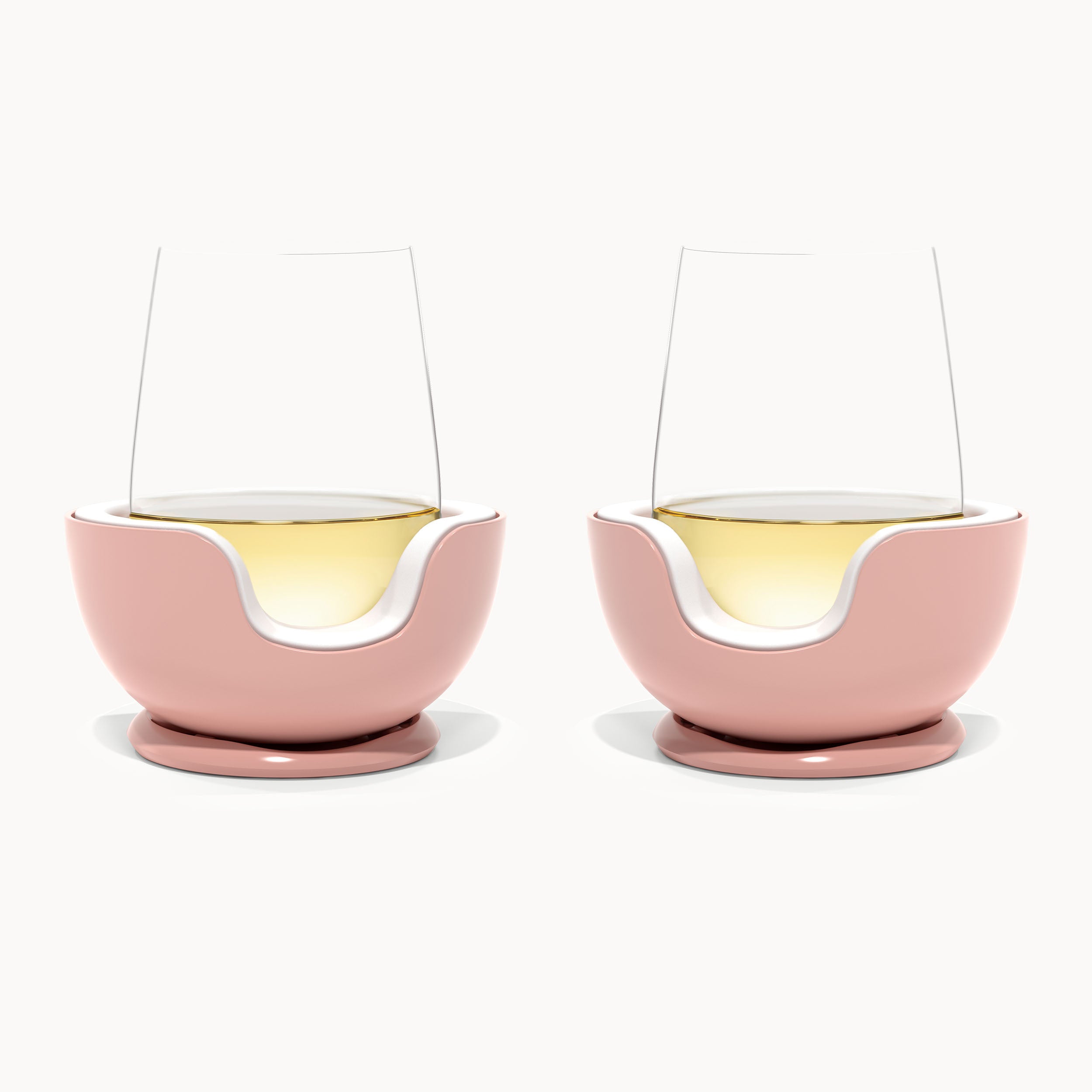 two stemless wine glass chillers e in rose color against a white background