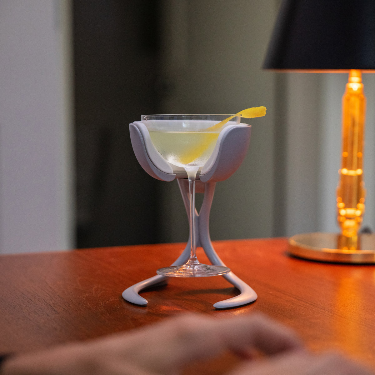 VoChill stemmed wine chiller holding a coupe glass with a perfectly crisp martini kept perfectly icy cold.