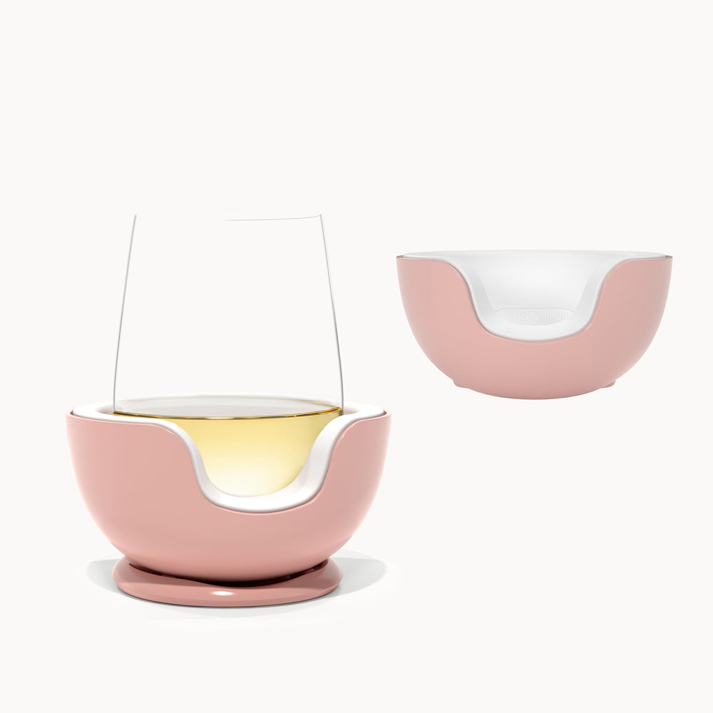 one stemless wine glass chiller plus one stemless extra chill cradle in rose color against a white background