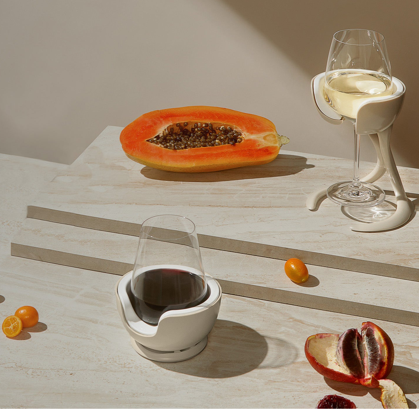 Stemmed and stemless wine glass chillers displayed in a still life setting