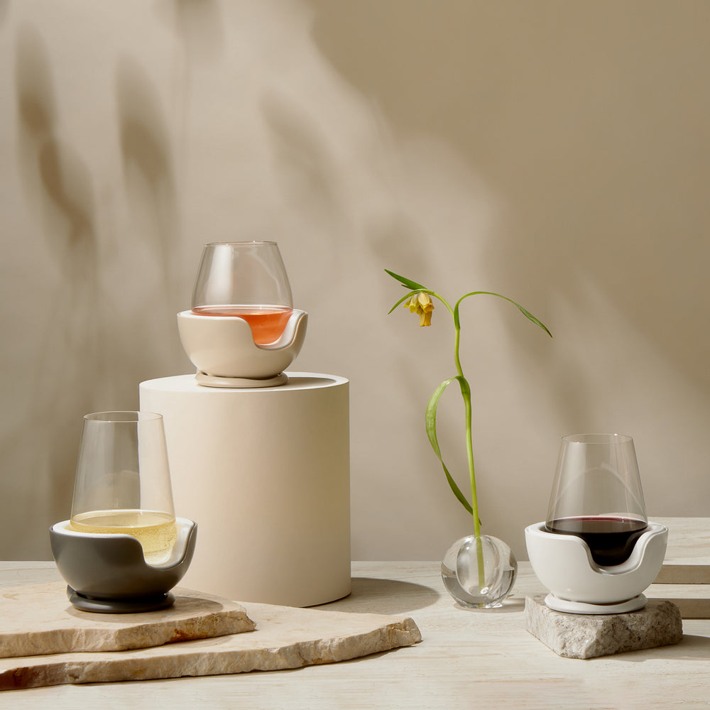 
                      
                        VoChill stemless wine glass chillers displayed in graphite, quartz, and sand colors
                      
                    